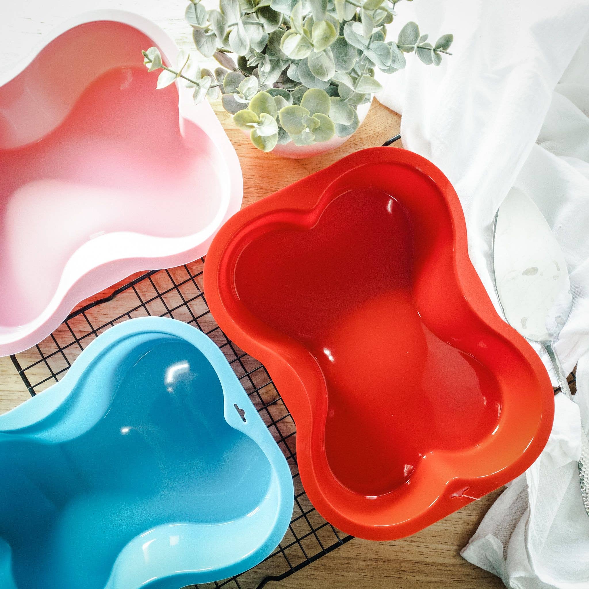 Puppy Cake LLC - Dog Bone Shaped Silicone Cake Pan: Pink